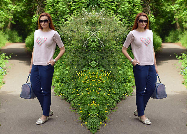 Pink motif sweater and loose navy pants