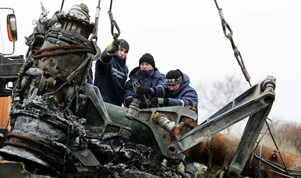 MH17 год спустя: кто платит за сбитый самолет MH17 год спустя: кто платит за сбитый самолет
