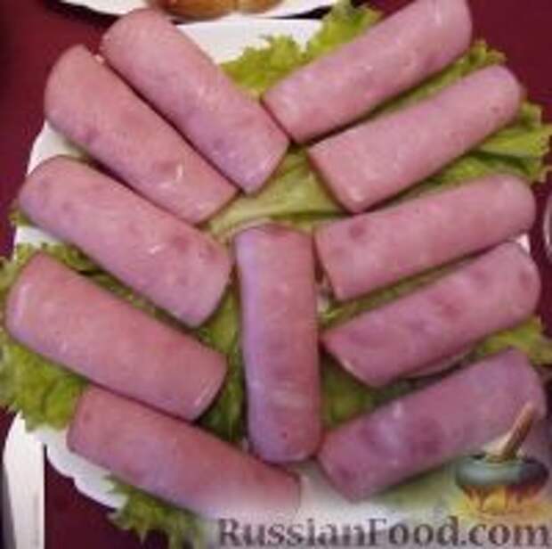 Фото к рецепту: Рулетики из ветчины с сыром