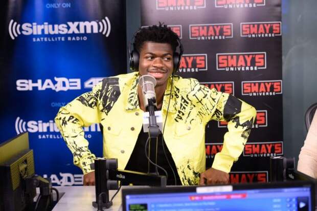 Lil Nas X laughs at Gen Z trying to cancel Eminem for controversial old lyrics.