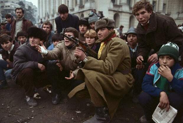 Soldier Sitting with Crowd Soldier Sitting with Crowd
