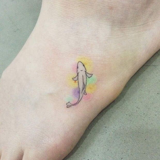 Tiny Foot Tattoo