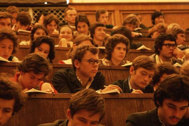 Students Attend a University Lecture