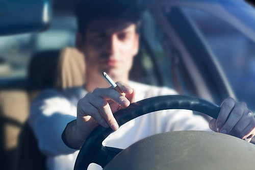 Smoking behind the wheel