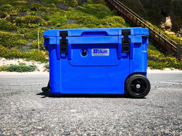 Blue Coolers roto-molded hard cooler in a parking lot