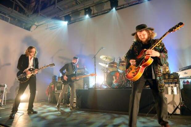 LOS ANGELES, CA - MAY 07:  (L-R) Guitarist Carl Broemel, bass player Tommy Blankenship and singer Jim James of My Morning Jacket perform onstage during a "KCRW Presents" session at Mack Sennett Studios on May 7, 2015 in Los Angeles, California.  (Photo by Scott Dudelson/Getty Images)