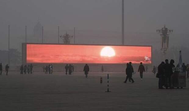 Китайцы могут увидеть рассвет только на экране из-за смога вирусное фото, фейк