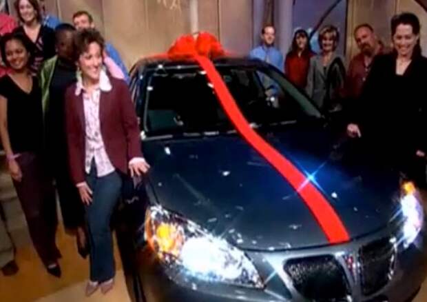 She first started small, giving 11 audience members a new fully-loaded Pontiac G6.