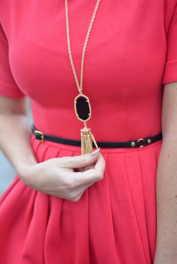 Red fit and flare dress, black and gold pendant