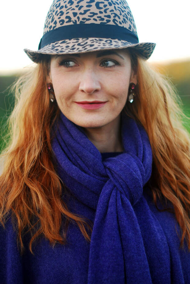 Purple poncho and leopard print hat