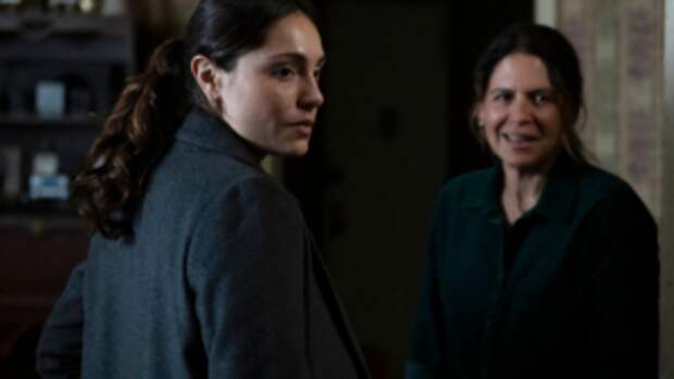 Silva standing with Fran and looking over her shoulder on Law & Order: SVU Season 26 Episode 12