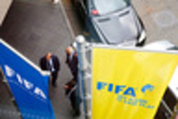 FIFA flags are pictured outside the Marritot hotel, where a meeting of the Confederation of African Football (CAF) is taking place, in Zurich, Switzerland, May 27, 2015.