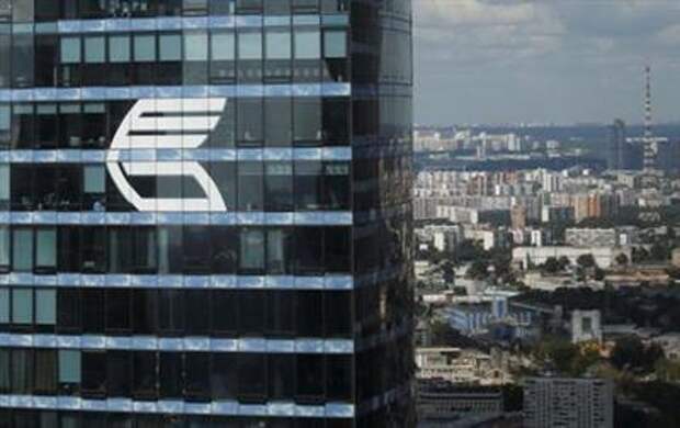 The logo of VTB Group is seen through a window of Imperia Tower on a facade of the Federatsiya (Federation) Tower at the Moscow International Business Center also known as 