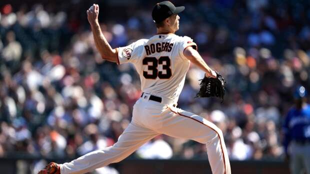 Taylor Rogers throws a pitch for the Giants during a game.