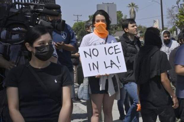 Body found, 100-plus arrested amid violent LA protests of ICE raids