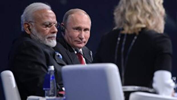 Президент РФ Владимир Путин и премьер-министр Индии Нарендра Моди на пленарном заседании Петербургского международного экономического форума 2017