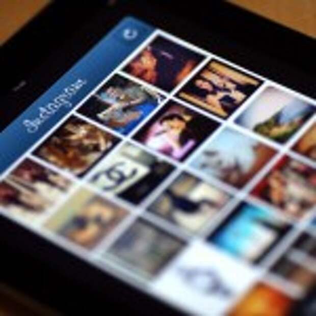Pictures appear on the smartphone photo sharing application Instagram on April 10, 2012 in Paris, one day after Facebook announced a billion-dollar-deal to buy the startup behind Instagram. The free mini-program lets people give classic looks to square photos using "filters" and then share them at Twitter, Facebook or other social networks. AFP PHOTO THOMAS COEX (Photo credit should read THOMAS COEX/AFP/Getty Images)