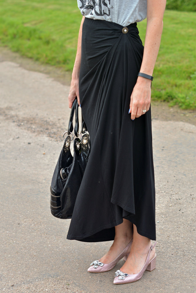 Black maxi skirt, graphic t-shirt, pointed block heels