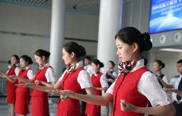 Суровые тренировки китайских стюардесс самолет, стюардессы, тренировка