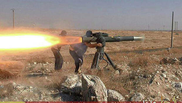 Боевики Исламского государства во время боя в районе города Хасеке на северо-востоке Сирии