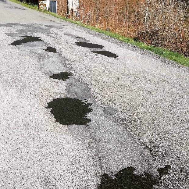 Снимки плохих бельгийских дорог в фотокниге