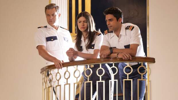 Max, Avery, and Tristan overlook the crowd during Doctor Odyssey Season 1 Episode 2.