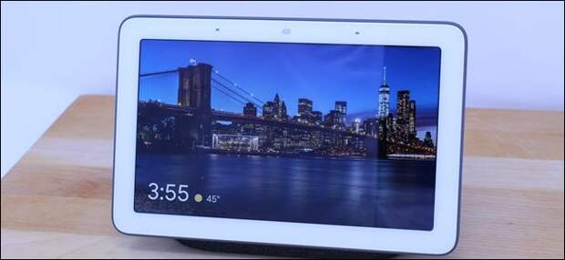 Google Home Hub displaying a city at night.