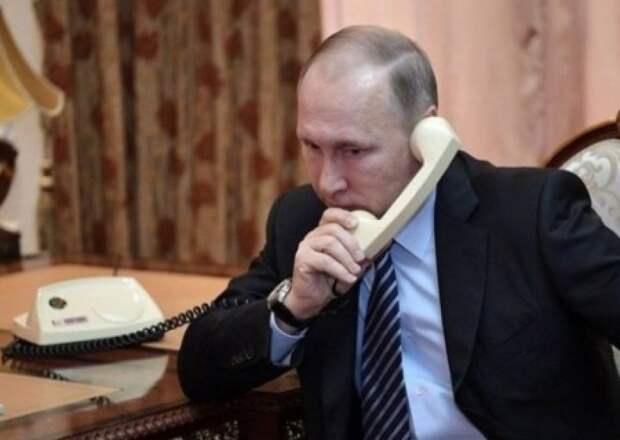 Путин провел телефонный разговор с Порошенко