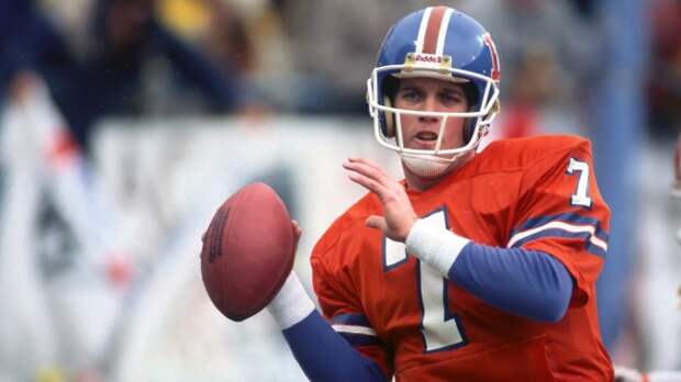 Denver Broncos QB John Elway throws a pass.