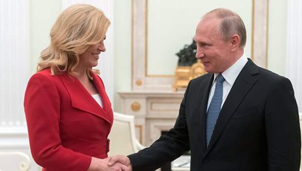 Владимир Путин и президент Хорватии Колинда Грабар-Китарович во время встречи. 15 июля 2018