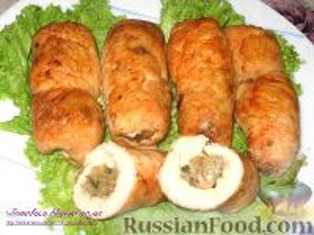 Фото к рецепту: Куриные рулеты с рисом и грибами