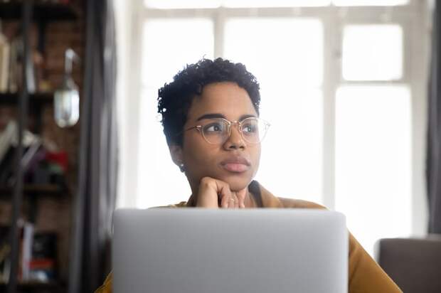 A person at a laptop.