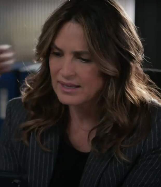 Benson looking down and appearing shocked on Law & Order: SVU Season 26 Episode 5