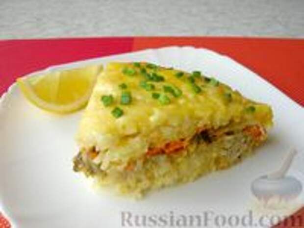 Фото к рецепту: Рисовая запеканка с рыбой и овощами