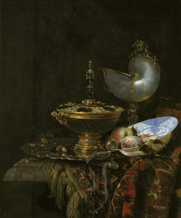 Willem Kalf (1619-93) - Pronk Still Life with Holbein Bowl, Nautilus Cup, Glass Goblet and Fruit Dish, 1678, Автор: Датская национальная галерея, Копенгаген (SMK) (Копенгаген (СМК) Датская национальная галерея)Датская национальная галерея, Копенгаген (SMK) (Живопись на Gallerix.ru)