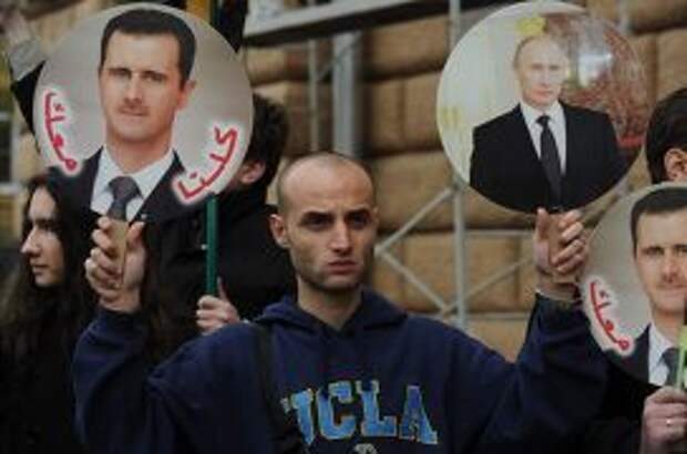 Портреты Башара Асада и Владимира Путина