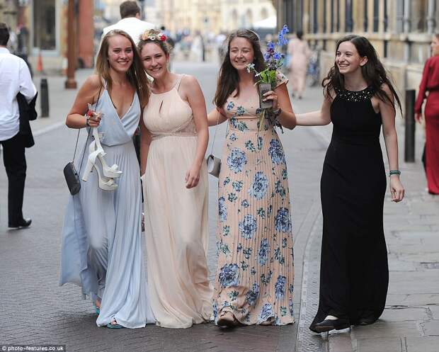Glamorous revellers donned exuberant gowns in pastel shades, but some couldn't help swapping their heels for flip-flops