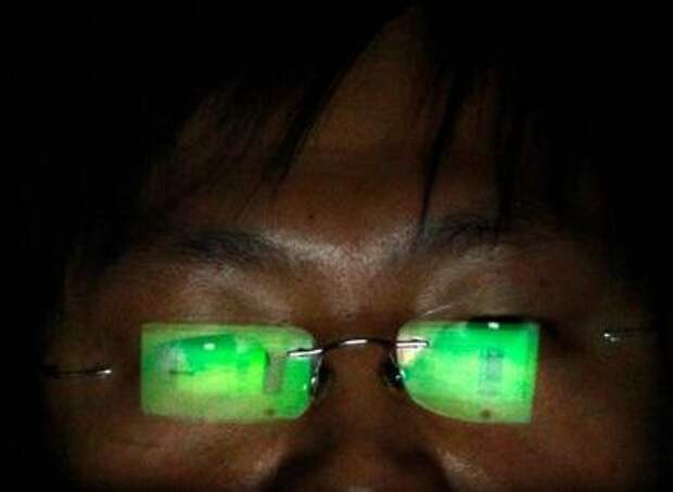 A hacker, who requests not to have his name revealed, works on his laptop in his office in Taipei July 10, 2013. Taiwan is the frontline in an emerging global battle for cyberspace, according to elite hackers in the island's IT industry, who say it has become a rehearsal area for the Chinese cyberattacks that have strained ties with the United States. The self-governing island, they say, has endured at least a decade of highly-targeted data-theft attacks that are then directed towards larger countries. Picture taken July 10, 2013. REUTERS/Pichi Chuang (TAIWAN - Tags: SCIENCE TECHNOLOGY POLITICS)