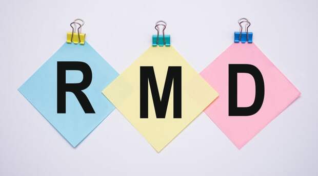 Paperclips, holding diamond-shaped papers that say R, M and D.