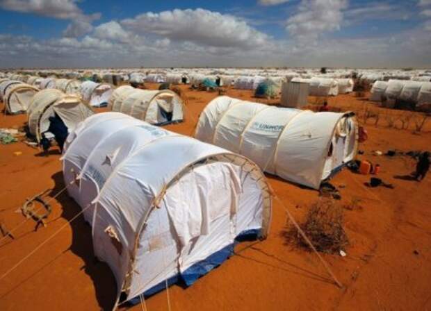 In this photo taken Friday, Aug. 5, 2011 tents are seen at the UNHCR's Ifo Extension camp outside Dadaab, eastern Kenya, 100 kilometers (62 miles) from the Somali border. The Dadaab refugee camp - the largest in the world - was built for 90,000 people. The current population is over 400,000 with thousands of new arrivals crammed into areas outside the refugee camp, waiting to be formally admitted. (AP Photo/Jerome Delay)