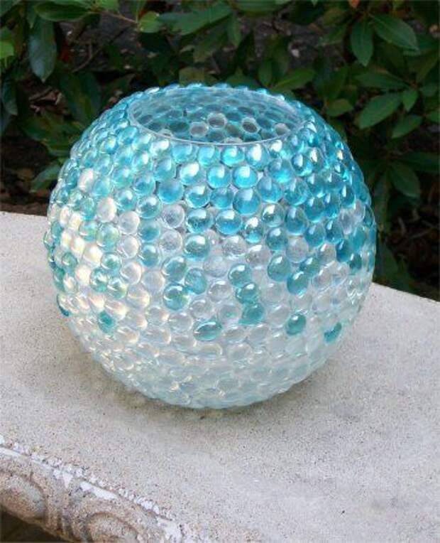 Make A Pretty Vase Out Of Marbles And A Plain Glass or Plastic Vase -Only do it in fall colors for me!
