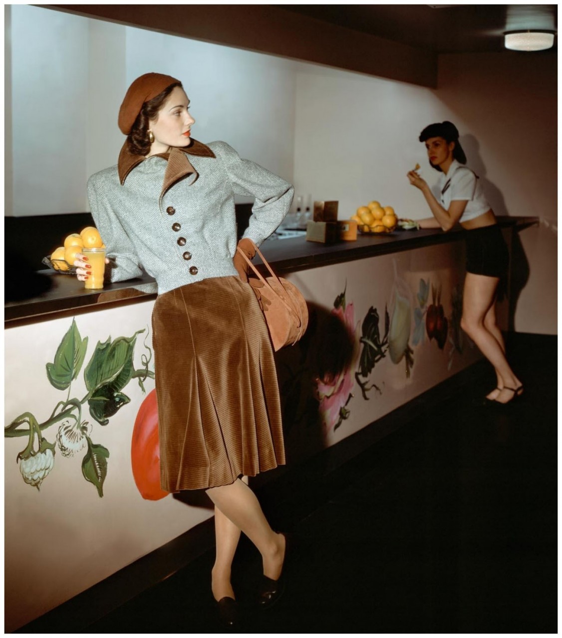 model-standing-at-ann-delafields-health-bar-in-the-richard-hudnut-salon-wearing-a-forstmann-tweed-and-corduroy-suit-photo-john-rawlings-1943