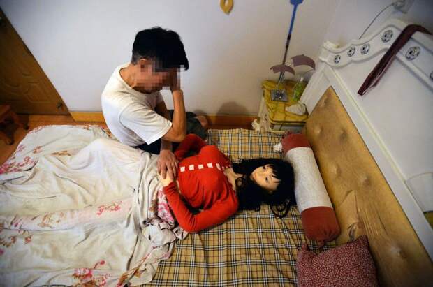 Man lives with sex doll to remember his deceased wife, Chongzhou city, Sichuan province, China - 18 Aug 2016