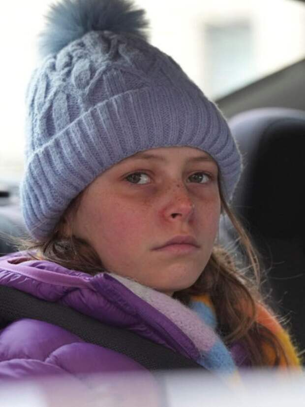 Haley looks out from the back seat of a car shortly before she is kidnapped on Law & Order: SVU Season 26 Episode 19.