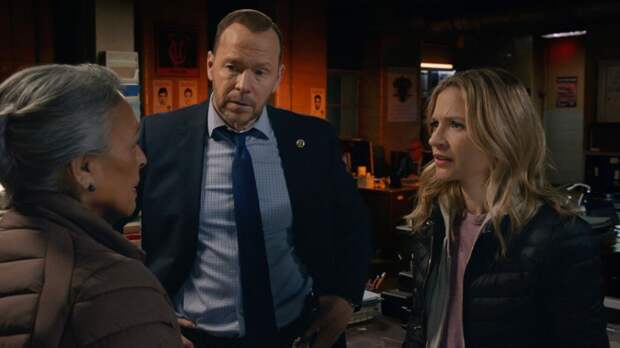 Danny and Eddie talking to an older woman on Blue Bloods Season 14 Episode 11