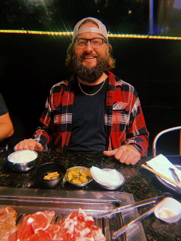 Man with beard wearing a JAXXON chain