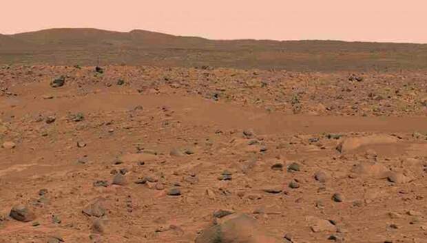This image, cropped from a larger panoramic image mosaic taken by the Mars Exploration Rover Spirit panoramic camera shows the rover's destination toward the hills nicknamed the Columbia Hills. REUTERS/NASA/JPLCornell/USGS