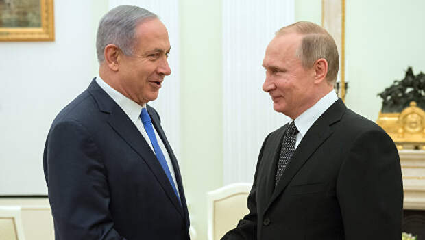 Президент России Владимир Путин (слева) и премьер-министр Израиля Биньямин Нетаньяху. Архивное фото