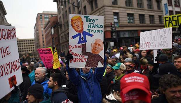 Протесты на улицах Вашингтона во время инаугурации избранного президента США Дональда Трампа. 20 января 2017 года