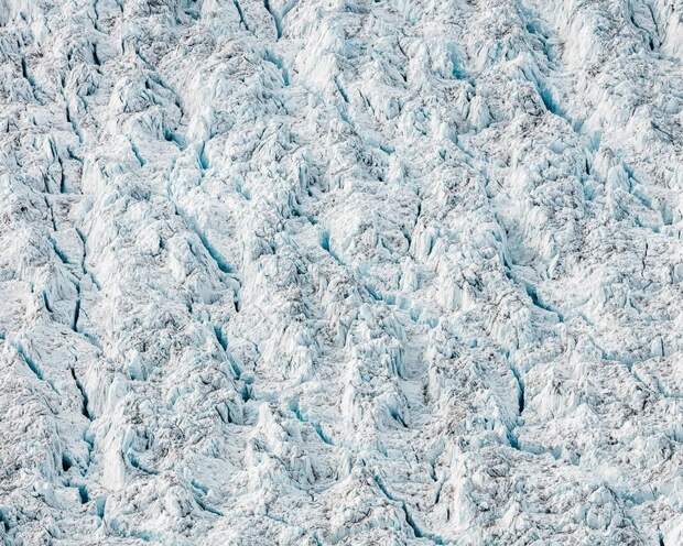 Фотограф сделал зловещие аэроснимки таяния ледяного покрова Гренландии